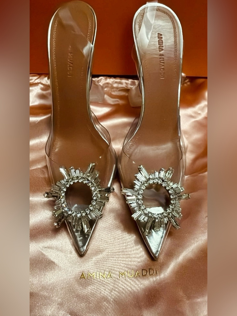 Amina Muaddi Clear Pointed Slingbacks with Crystal Sunburst and Orange Insole